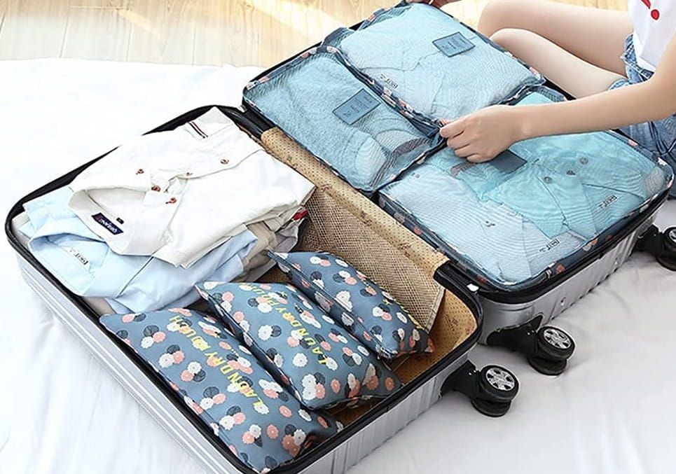 Dėklų rinkinys lagaminui, įvairių spalvų