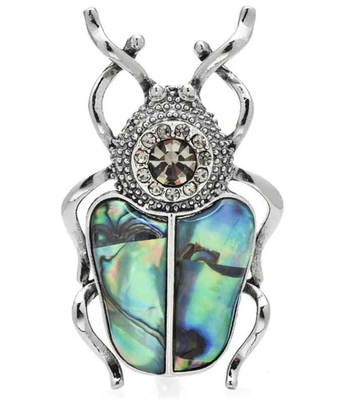 Prabangi Sidabro Spalvos Sagė „Skarabėjus“ su Perlamutru ir Cirkoniu