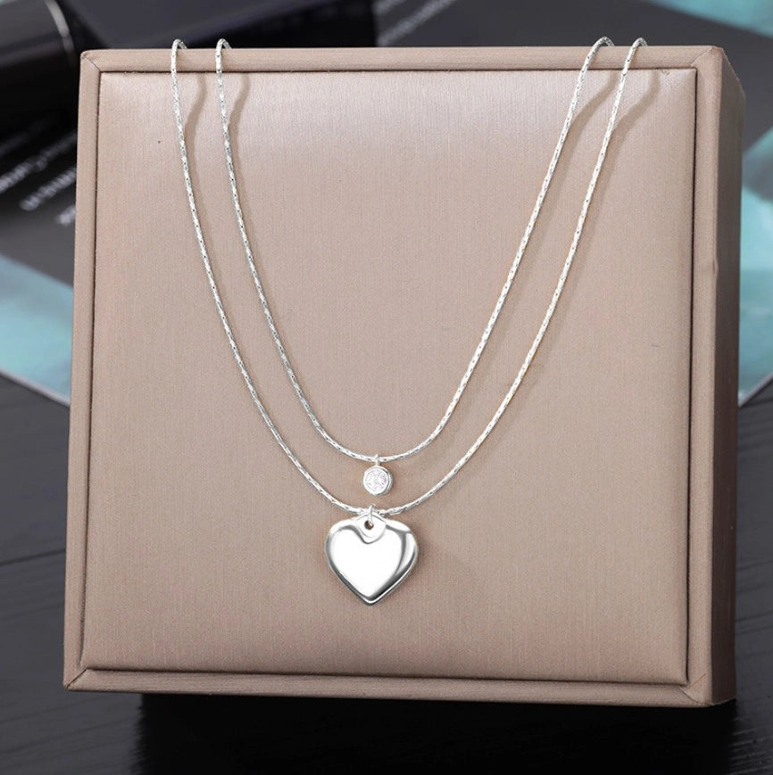 Elegantiška dviguba sidabrinė grandinėlė su širdimi ir cirkoniu