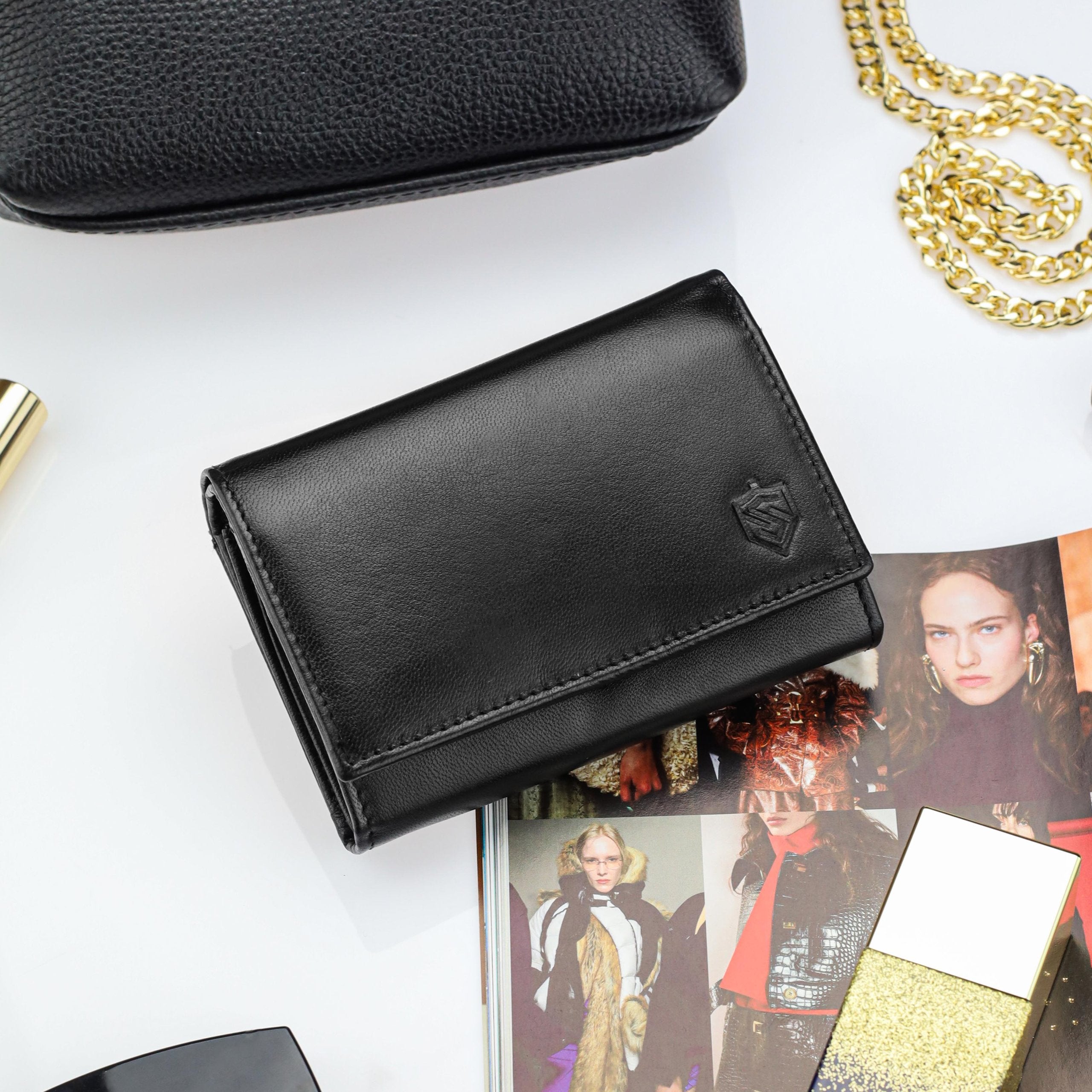 Moteriška odinė piniginė Stevens P40, juoda