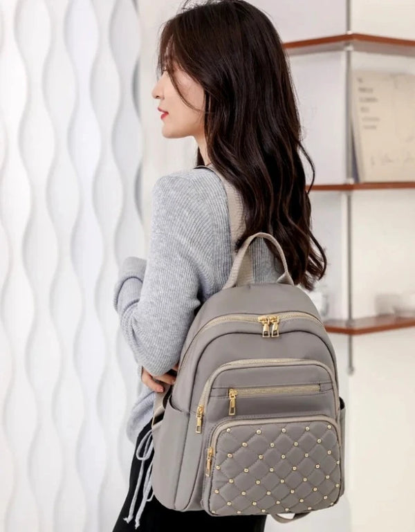 Neperšlampama kuprinė moterims, pilka