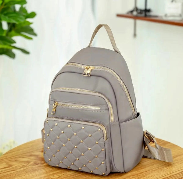 Neperšlampama kuprinė moterims, pilka