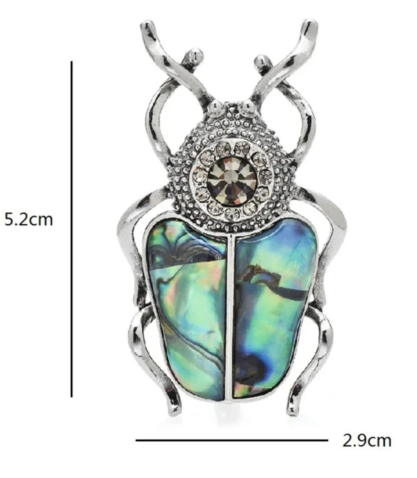 Prabangi Sidabro Spalvos Sagė „Skarabėjus“ su Perlamutru ir Cirkoniu