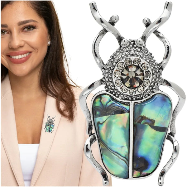 Prabangi Sidabro Spalvos Sagė „Skarabėjus“ su Perlamutru ir Cirkoniu