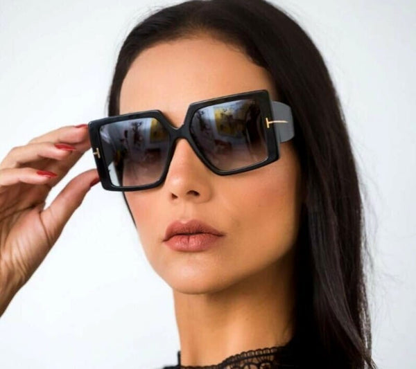 Dideli moteriški „cat-eye“ saulės akiniai S11