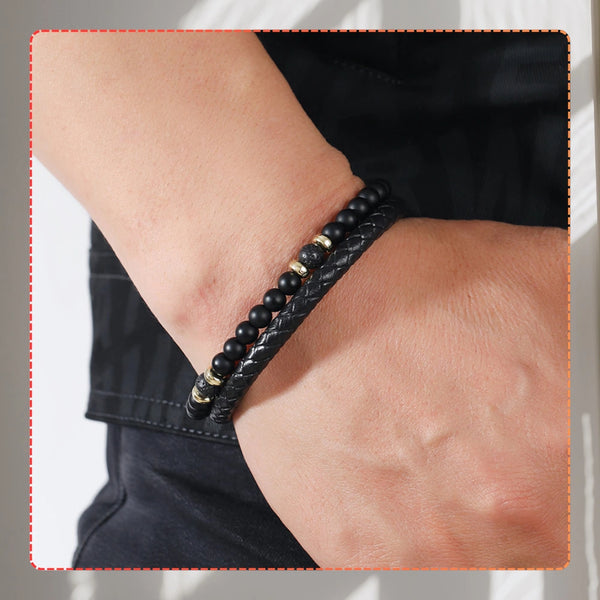 Vyriška apyrankė – juoda oda, akmenys ir auksiniai žiedai