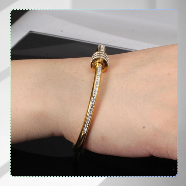 Auksinė standi apyrankė su cirkoniais