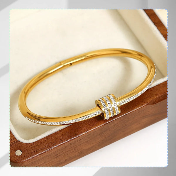 Auksinė standi apyrankė su cirkoniais