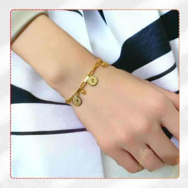 Auksinė apyrankė su monetų pakabukais, chirurginis plienas