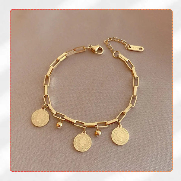 Auksinė apyrankė su monetų pakabukais, chirurginis plienas