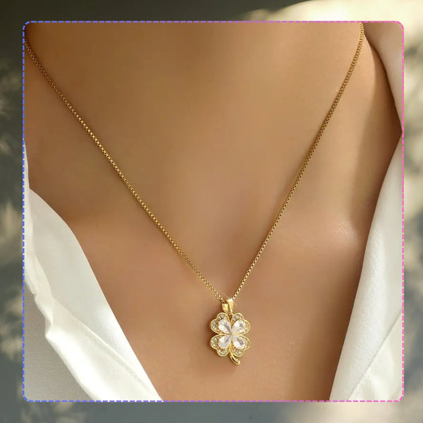 Auksinis vėrinys su cirkoniais ir keturlape dobele, chirurginis plienas