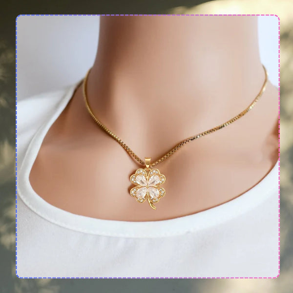 Auksinis vėrinys su cirkoniais ir keturlape dobele, chirurginis plienas