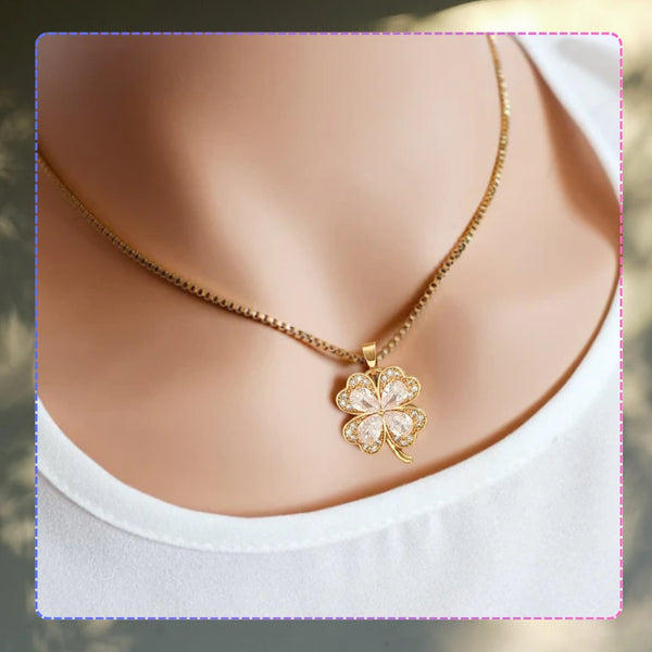 Auksinis vėrinys su cirkoniais ir keturlape dobele, chirurginis plienas