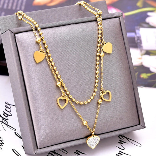 Auksuotas plieninis vėrinys su širdies pakabuku ir cirkoniais