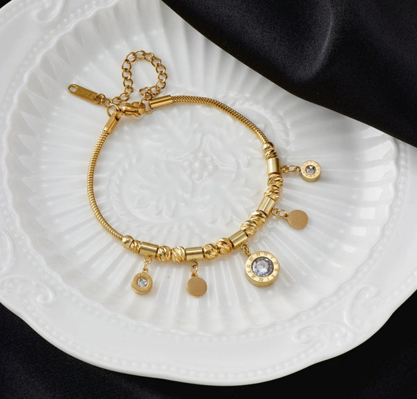 Auksinė apyrankė su pakabukais, elegantiška, chirurginis plienas