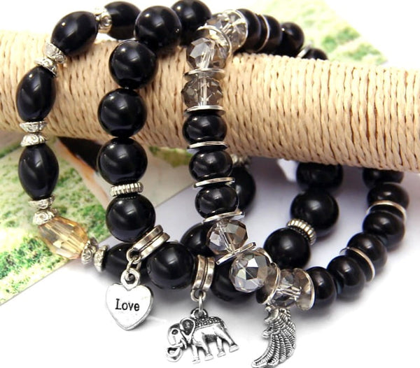 Apyrankių rinkinys su perlais ir pakabukais: sparnas, meilė, dramblys