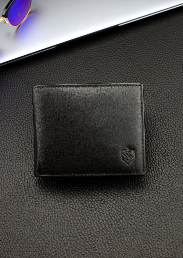 Dovanų komplektas vyrui – STEVENS odinė piniginė su RFID apsauga, išgyvenimo kortelė ir dovanų maišelis 325